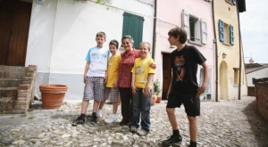 A smiling family gathered together at home