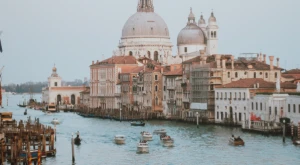 Panoramic view of Venice with its canals and rooftops at sunset