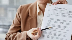 Person holding an employment contract