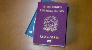 Italian passport open on a surface